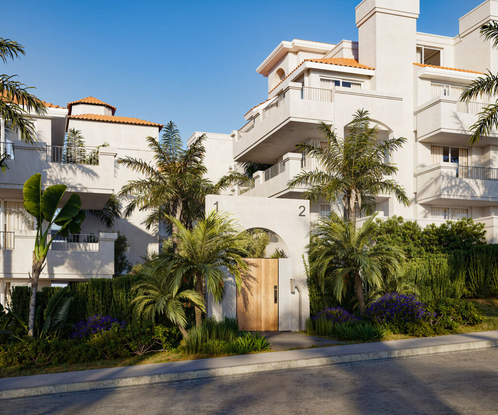Privé Malibu modern white residences with contemporary architecture, palm trees, and tropical landscaping under blue sky.